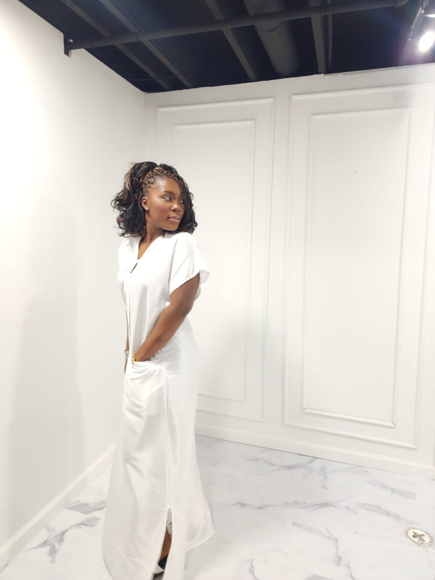white shtraight dress with front pockets