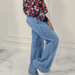Bold Floral Bomber Jacket with Wide-Leg Jeans Set